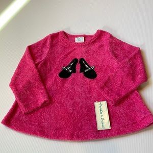 Peaches n Cream long sleeve pink fuzzy top with black heel details. Size 4T